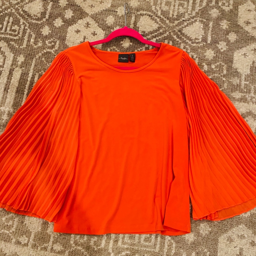 Orange blouse with pleated flutter sleeves